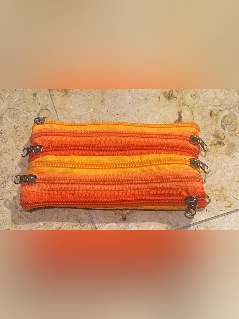 Striped Two Tone Orange 7 Zipper Pouch